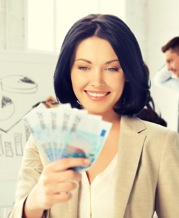 Happy Businesswoman with Cash 
